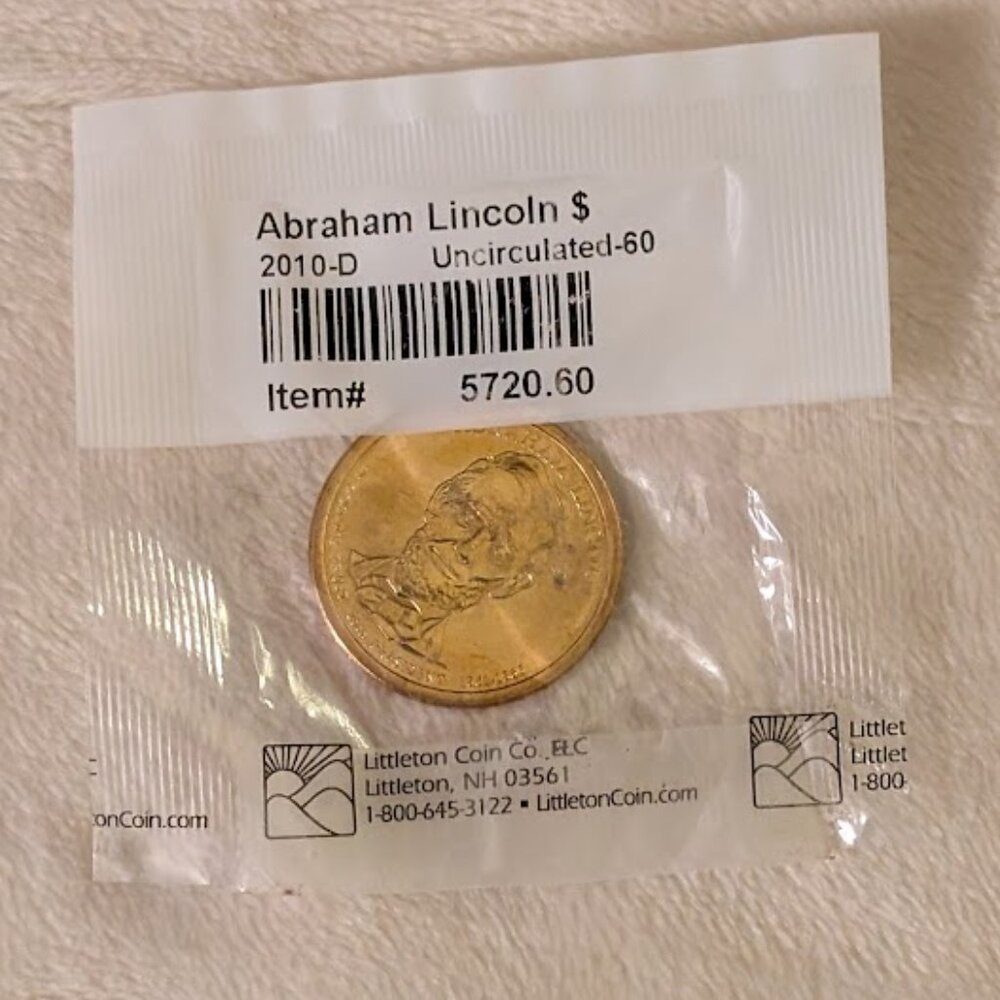 2010-D UC GRADE 60 LINCOLN $1 COIN